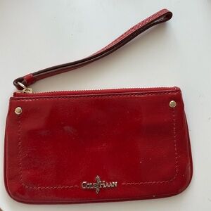 Like new Cole Haan red patent wristlet